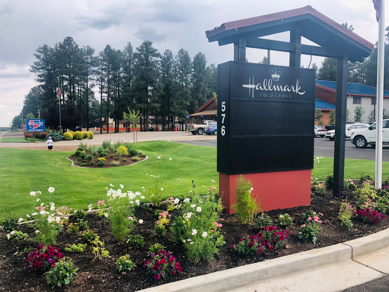 A commercial property maintained by It's Magic Landscaping & Design - Kim's Hallmark Shop in Pinetop