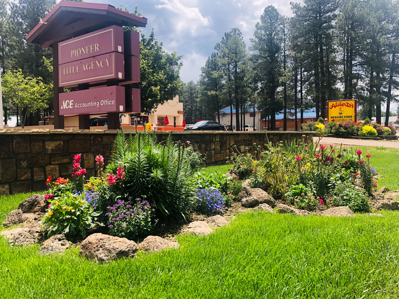 A commercial property maintained by It's Magic Landscaping & Design - Pinetop Pioneer Title Agency